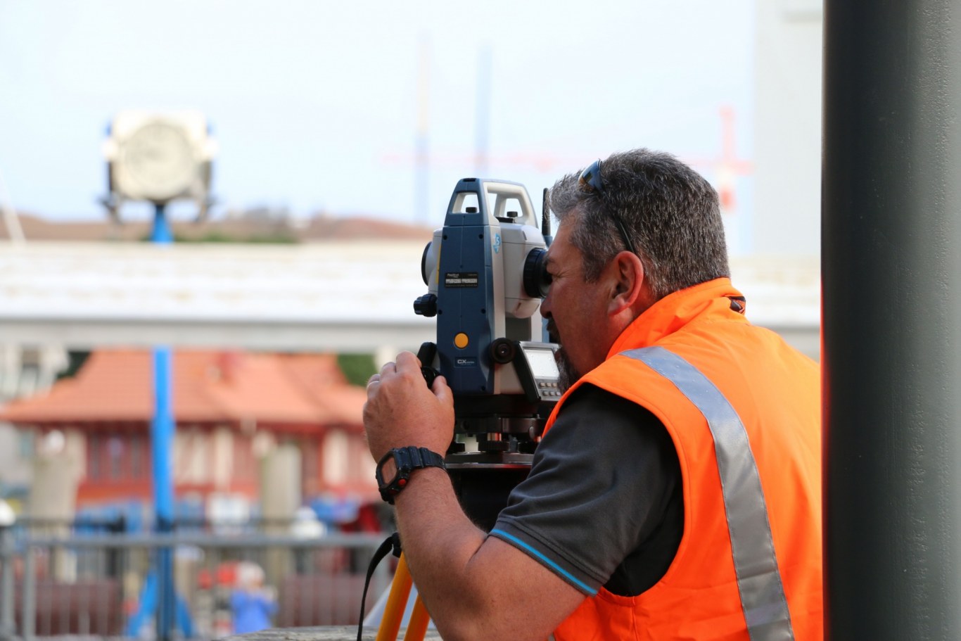 Land Surveyor surveying the area